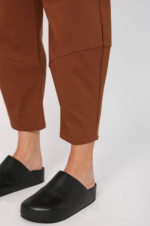 furthest pant / tan brown