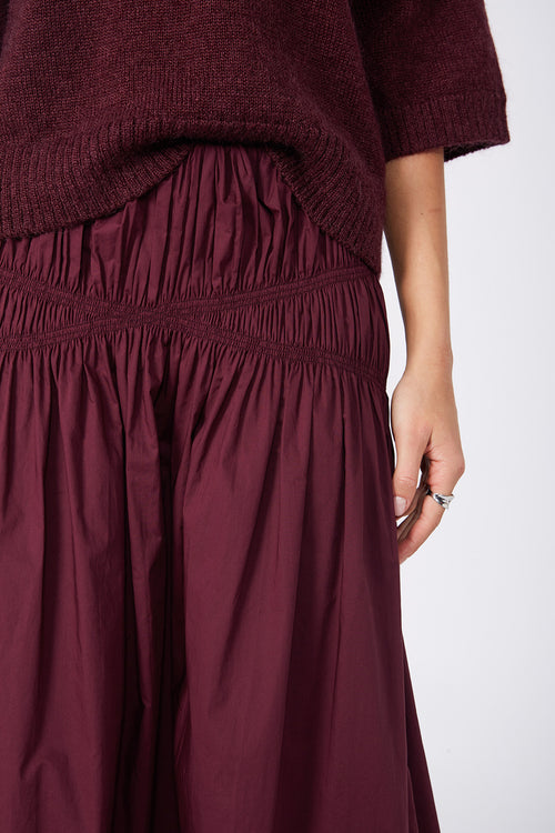 disperse skirt / dark plum